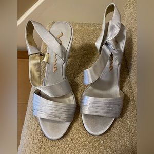 Nina brand silver satin heels.  Size 8.5